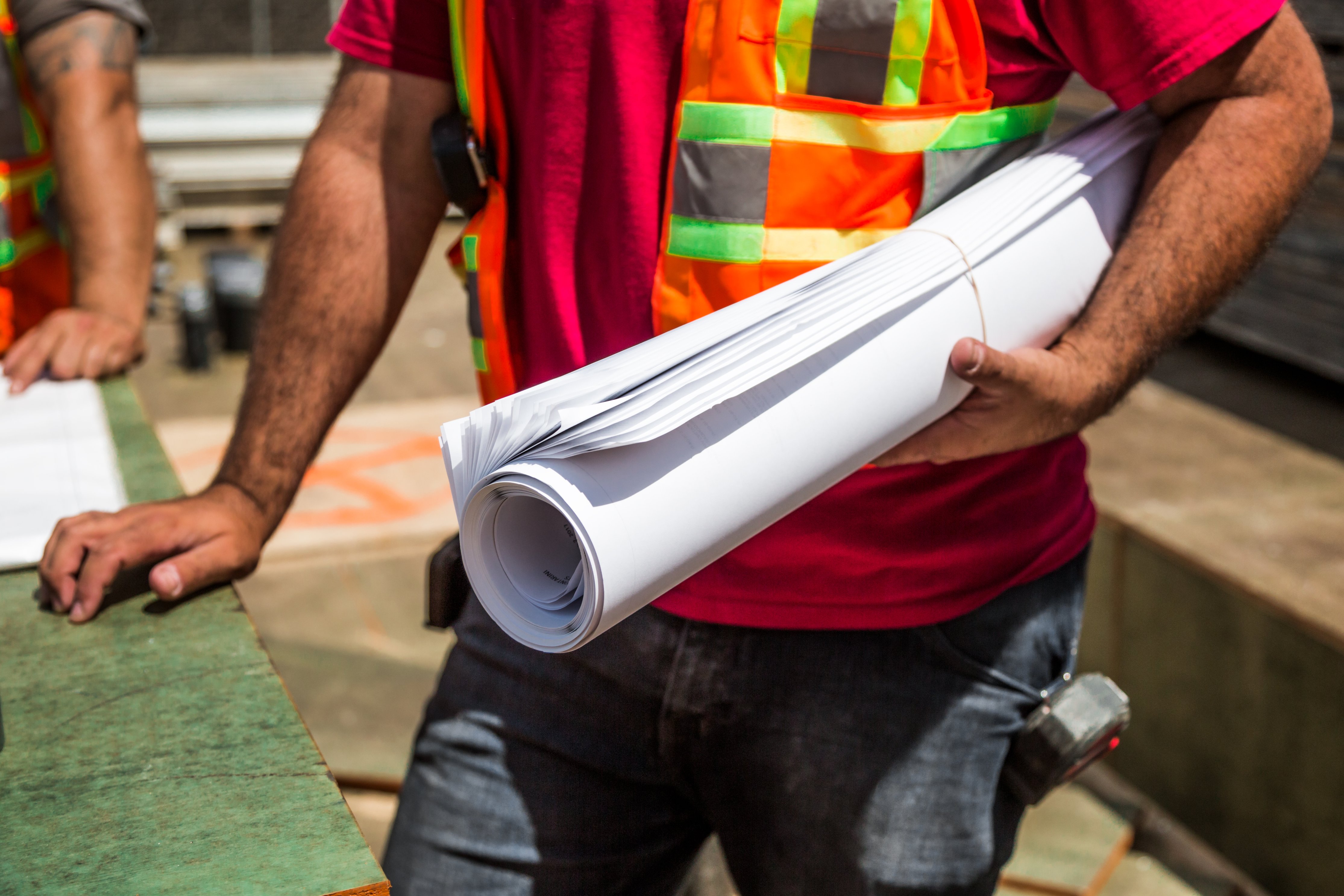 building-plans-in-hand_4460x4460.jpg